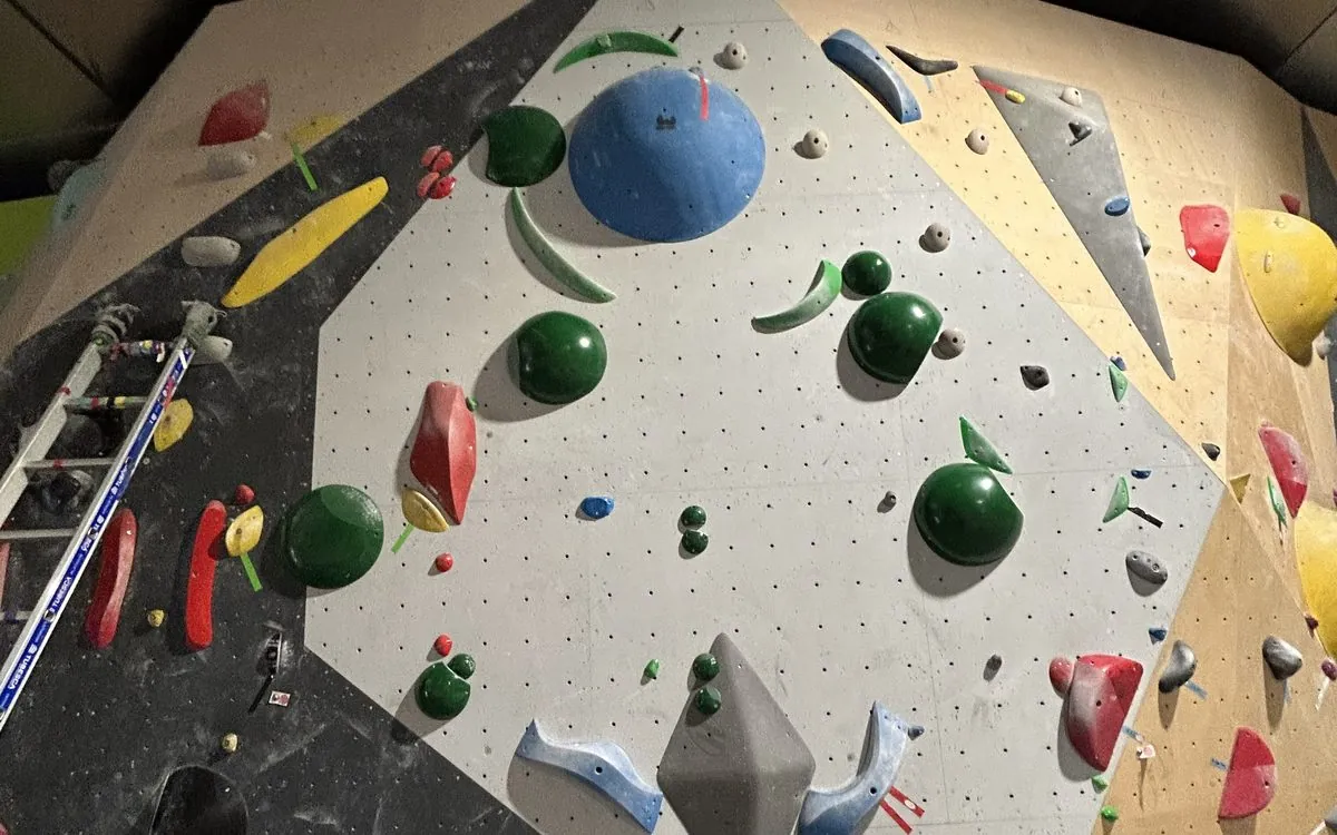A fully set bouldering wall, overall view